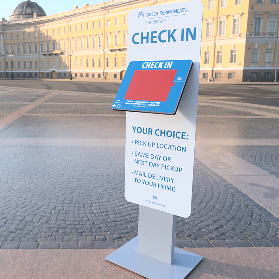 A Standalone kiosk with a graphic panel and graphic faceplate.