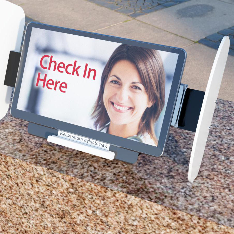 A kiosk enclosure with privacy shields and a stylus attachment.
